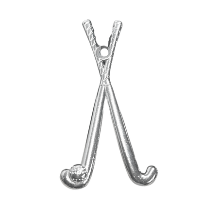 Silver charm shaped like crossed hockey sticks with a small ball at the bottom on a white background
