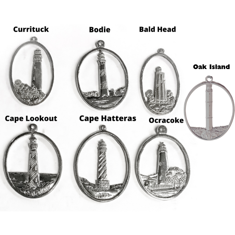 Set of silver pendants with lighthouse designs and labels on a white background